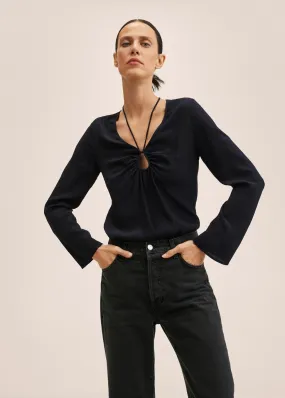 Blusa dettaglio spacco