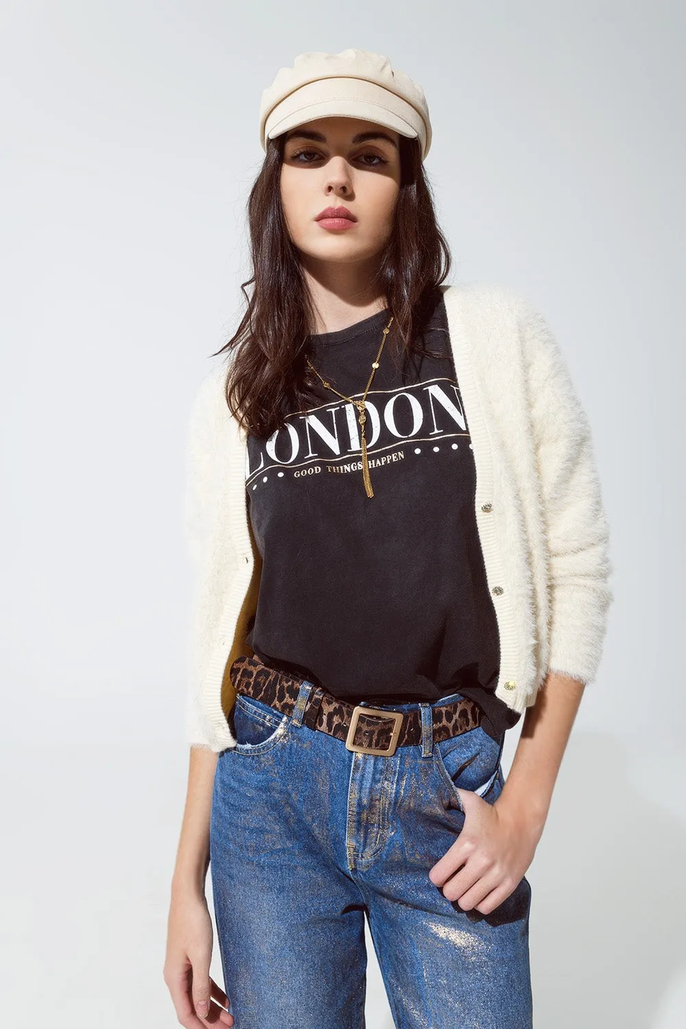 Cardigan panna e soffice con fondo argentato